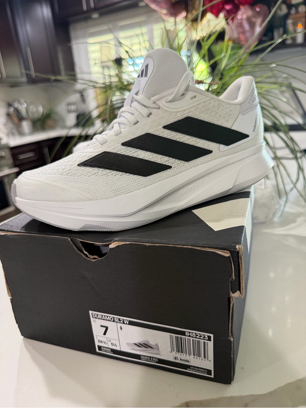 adidas Women’s White Athletic Shoes with Black Stripes